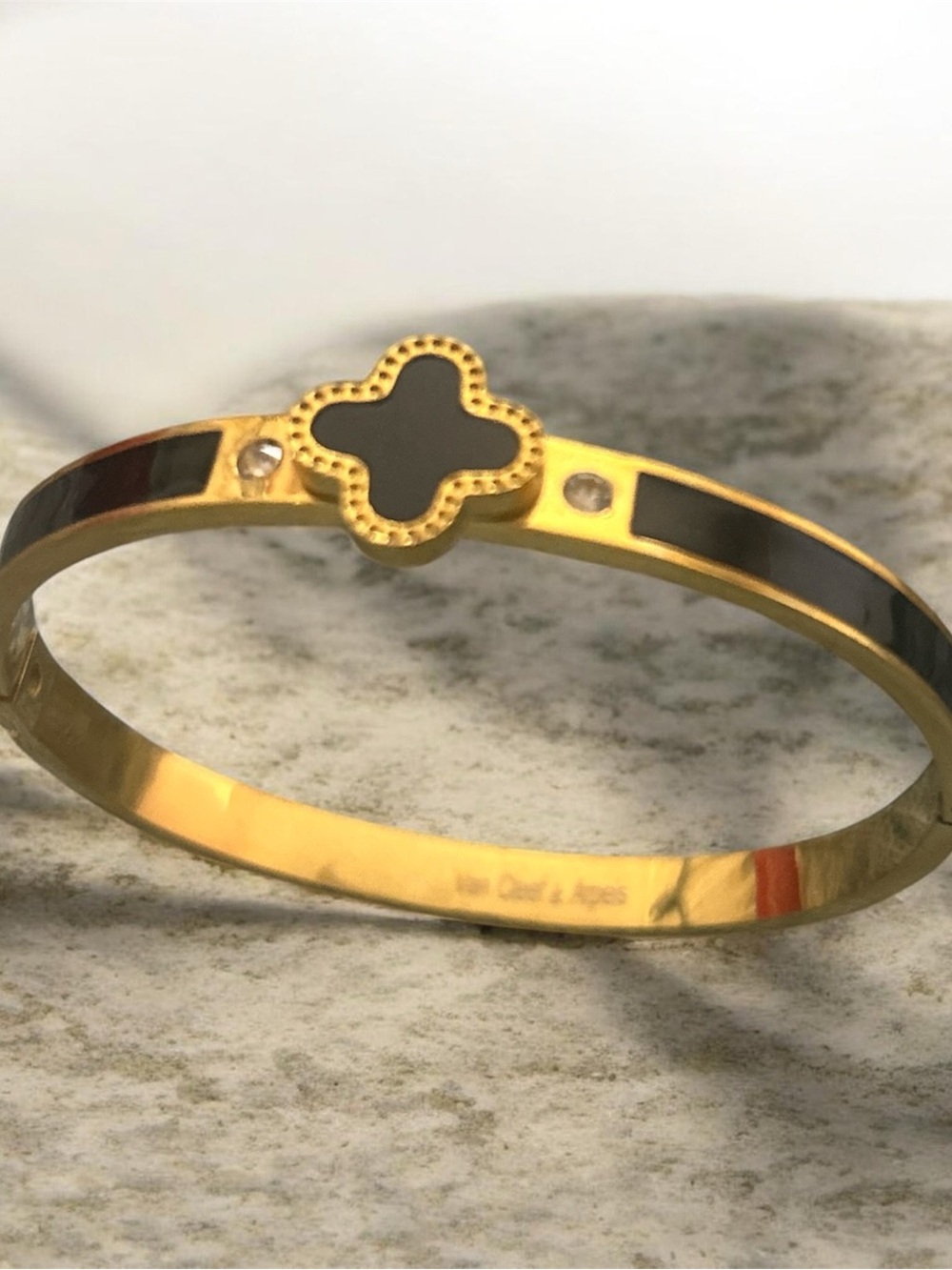 Gold-Tone Bracelet with Black Clover Accent and Crystal Details
